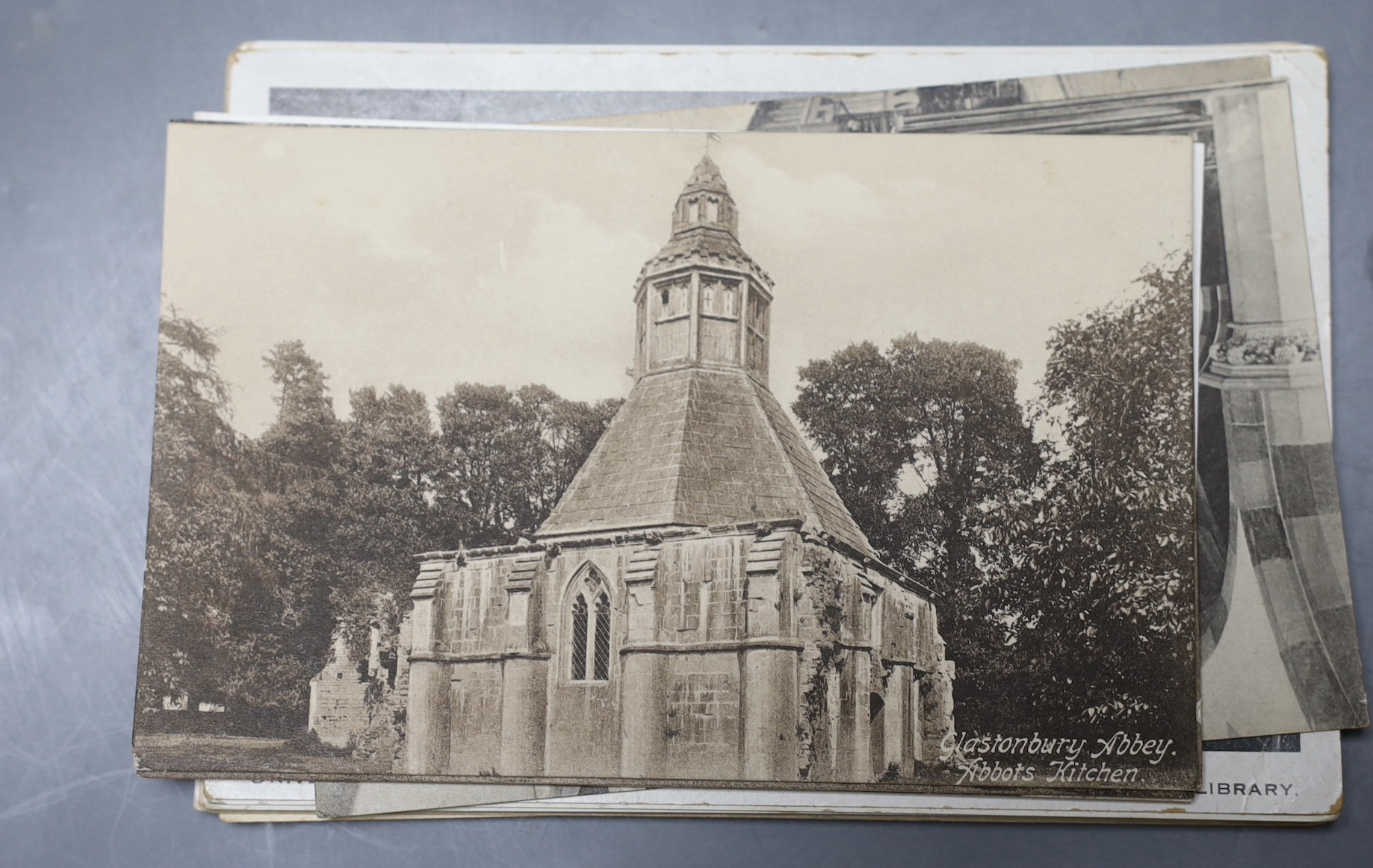 A collection of 20th century and later postcards including bi-plane, The British Museum, Sussex and others.